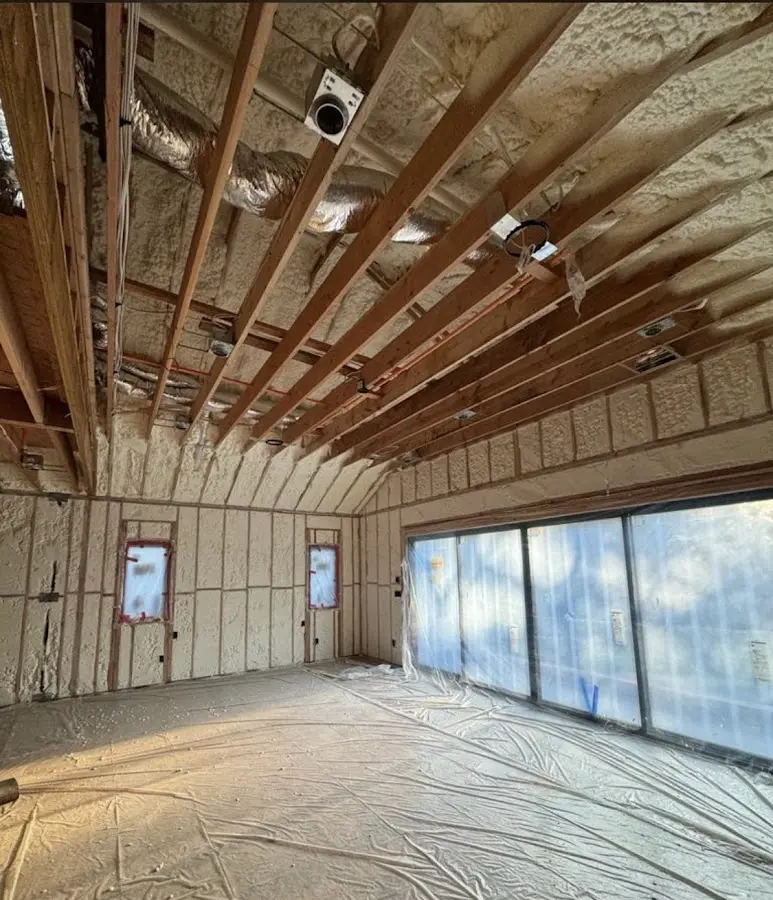 Interior walls and ceiling insulated with spray foam during new construction in River Ridge